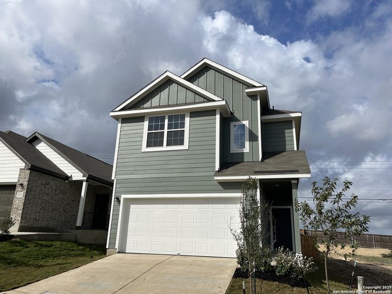 Front exterior of a new home in Katzer Ranch, Converse, TX, highlighting curb appeal (Image 2).