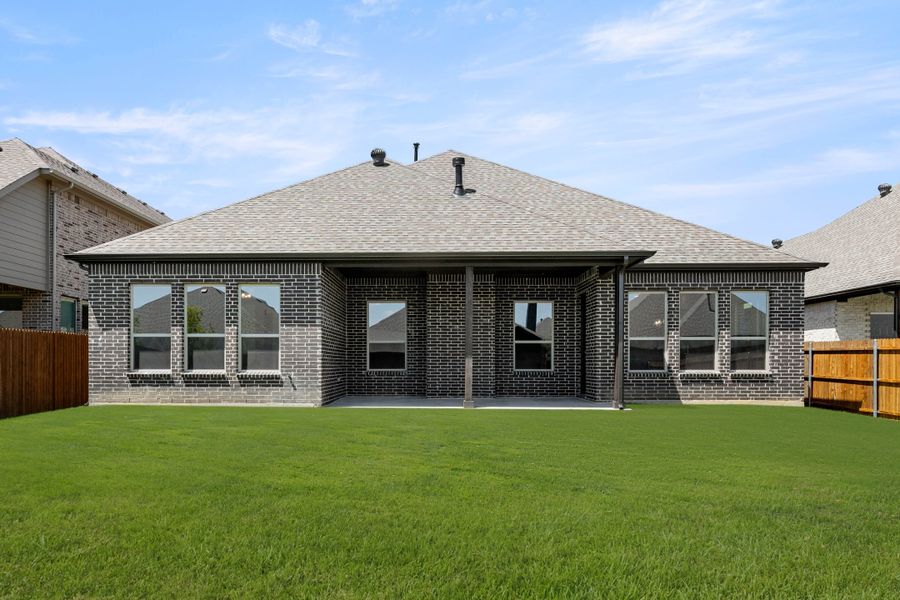 Exterior details and patio area of a home in Timberbrook, Justin (Image 4).