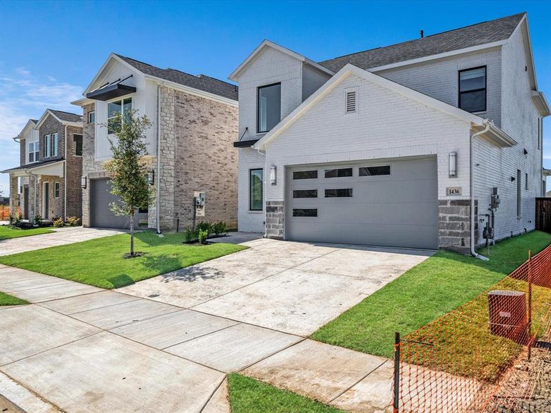 Exterior details and patio area of a home in Royal Court, Frisco (Image 16).