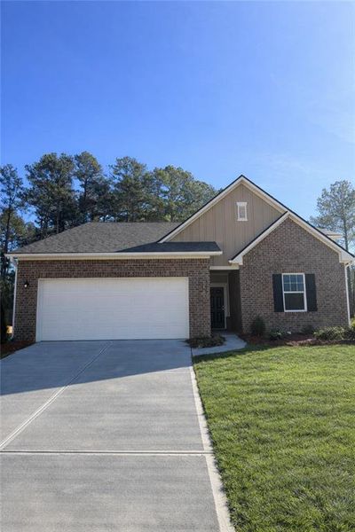 Front exterior of a new home in Silverton, Dacula, GA, highlighting curb appeal (Image 2). Front exterior of a new home in Silverton, Dacula, GA, highlighting curb appeal (Image 2).