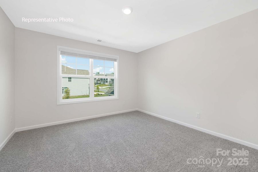 Spacious, unfurnished interior of a new home in Sanctuary at Southgate, Indian Trail (Image 17).