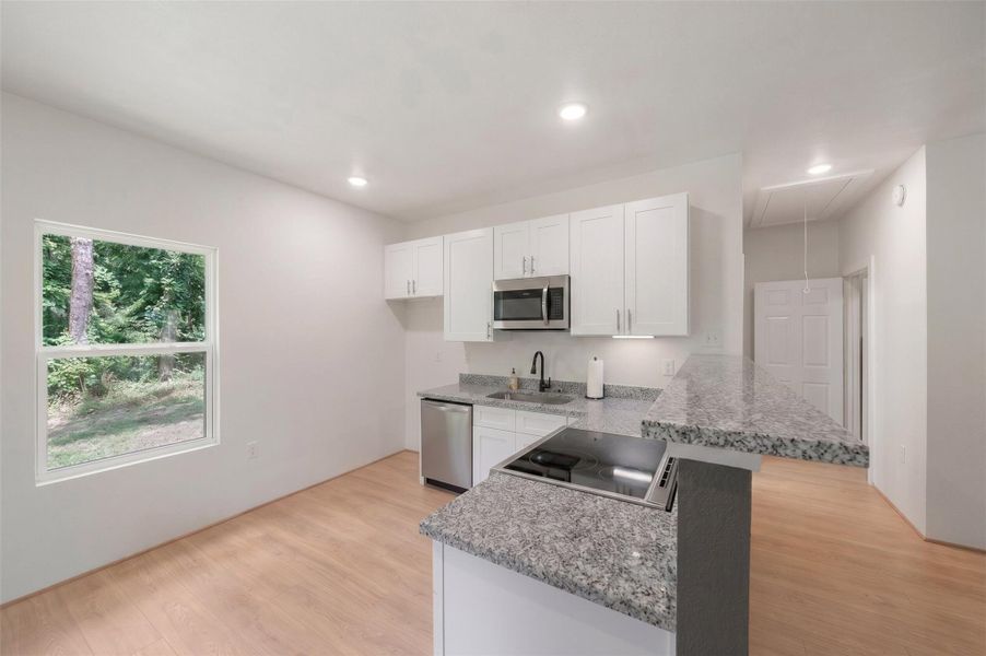 Furnished interior view inside a new home in , Trinity (Image 4).