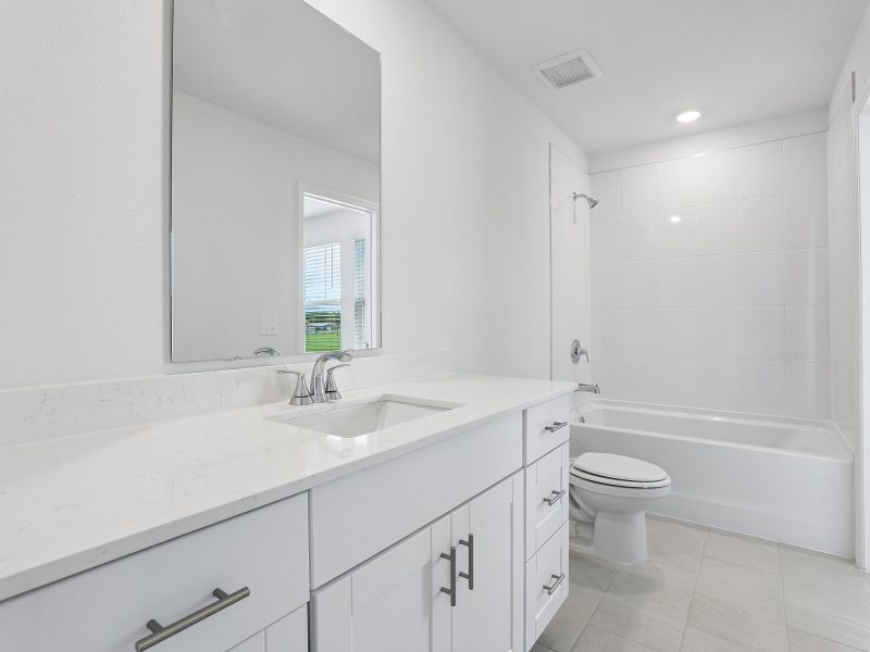 Furnished interior view inside a new home in The Meadow at Crossprairie Townes, St. Cloud (Image 6).
