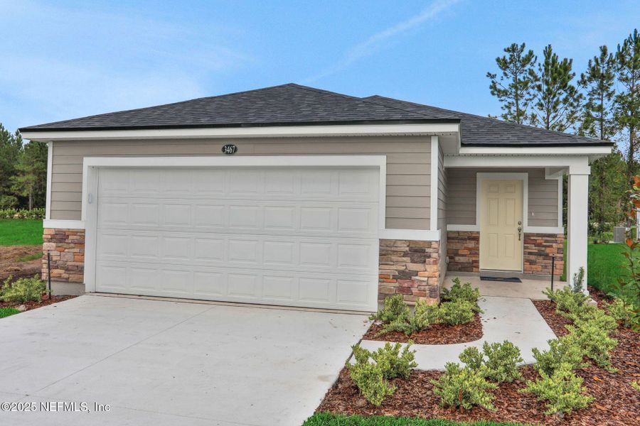 Front exterior of a new home in , Green Cove Springs, FL, highlighting curb appeal (Image 23). Front exterior of a new home in , Green Cove Springs, FL, highlighting curb appeal (Image 23).