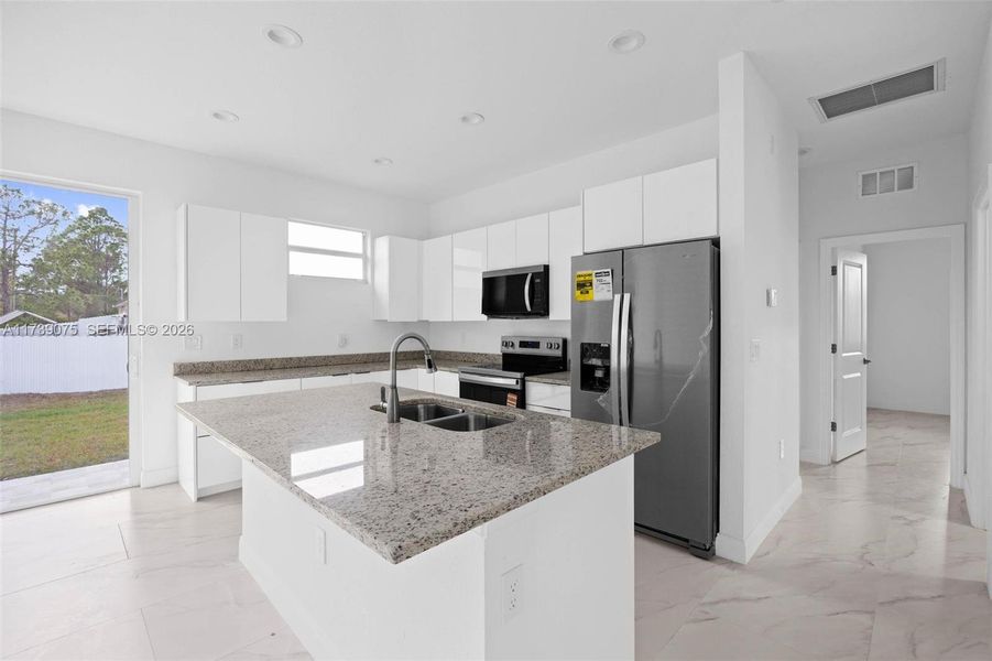 Furnished interior view inside a new home in , Lehigh Acres (Image 10). Furnished interior view inside a new home in , Lehigh Acres (Image 10).
