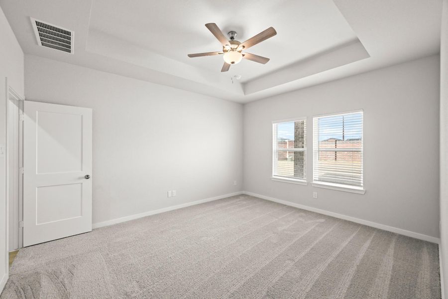 Spacious, unfurnished interior of a new home in Sunterra, Katy (Image 17).