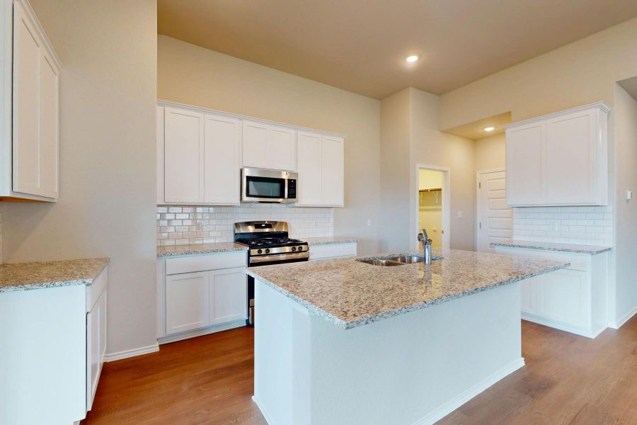 Furnished interior view inside a new home in Carillon, Manor (Image 10).
