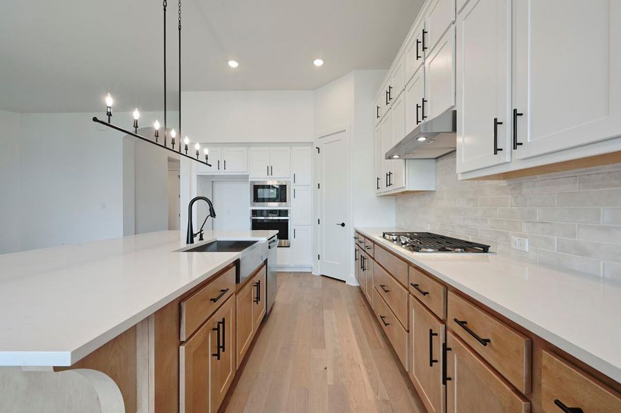 Furnished interior view inside a new home in 6 Creeks at Waterridge: 55ft. lots, Kyle (Image 9). Furnished interior view inside a new home in 6 Creeks at Waterridge: 55ft. lots, Kyle (Image 9).