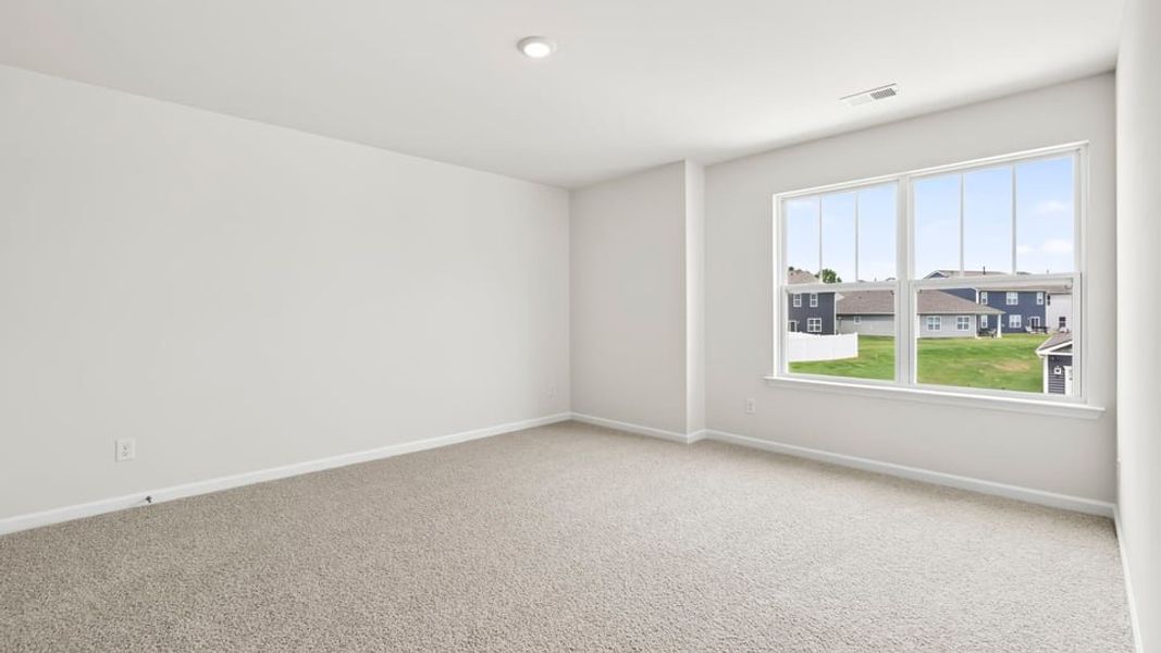 Spacious, unfurnished interior of a new home in Durbin Meadows Traditions, Fountain Inn (Image 31).