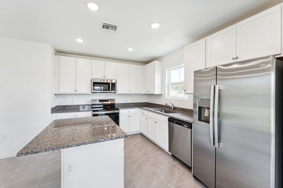 Furnished interior view inside a new home in Aspire at Port St. Lucie, Port St. Lucie (Image 7).