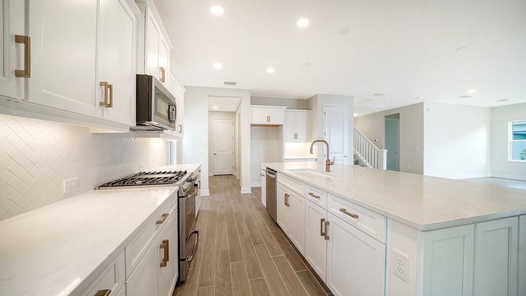 Furnished interior view inside a new home in Palm Grove Real Estate and Homes for Sale in Lakewood Ranch, FL - Neal Communities, Lakewood Ranch (Image 3).