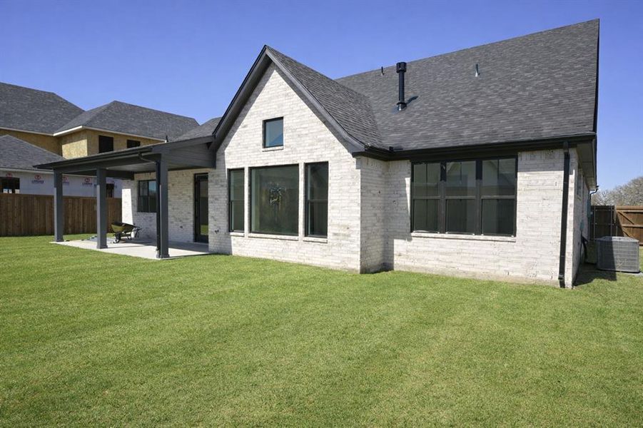 Exterior details and patio area of a home in , Pottsboro (Image 4).