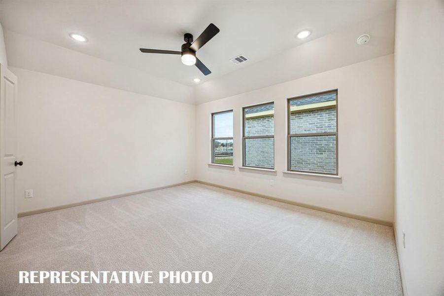 With high ceilings, plush carpeting and a wall of windows, this owner's suit is the perfect place for rest and relaxation.  REPRESENTATIVE PHOTO