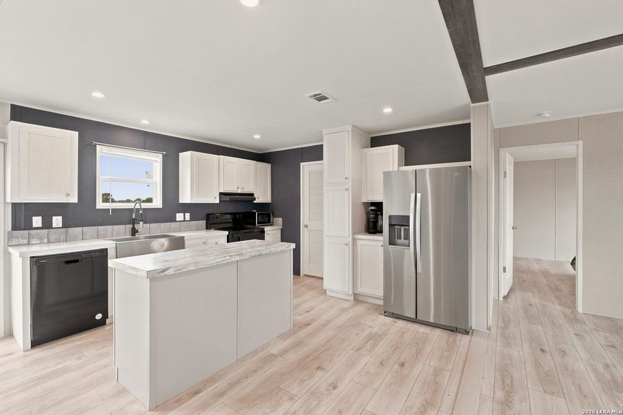 Furnished interior view inside a new home in , Hondo (Image 3).