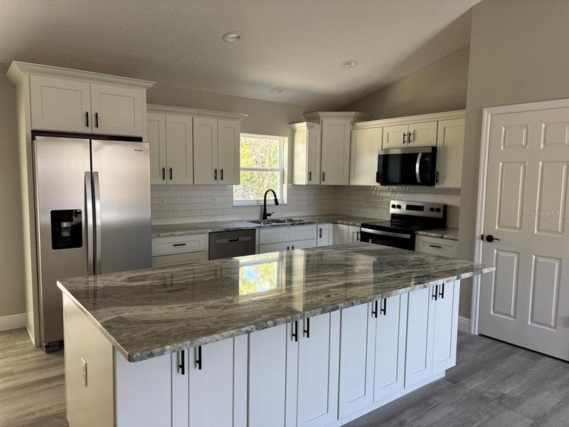 Furnished interior view inside a new home in , Dunnellon (Image 6).