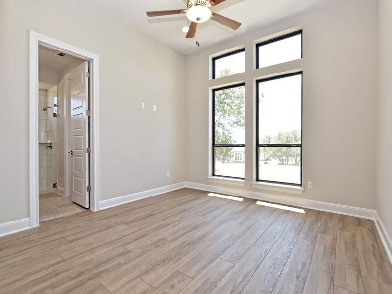 Representative unfurnished interior of a home built from the Avalon by Giddens Homes in Scofield Farms Estates, Georgetown (Image 184).