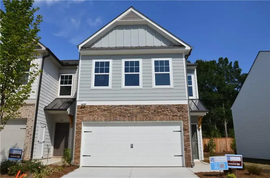 Front exterior of a new home in Owen Preserve, Canton, GA, highlighting curb appeal (Image 19). Front exterior of a new home in Owen Preserve, Canton, GA, highlighting curb appeal (Image 19).