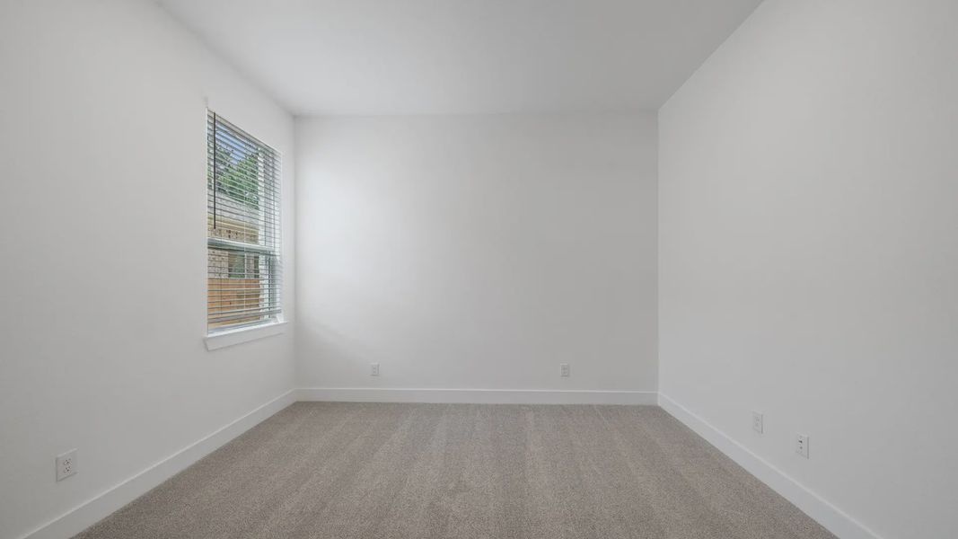 Representative unfurnished interior of a home built from the Waterloo by Chesmar Homes in Attwater 65's, Waller (Image 32).