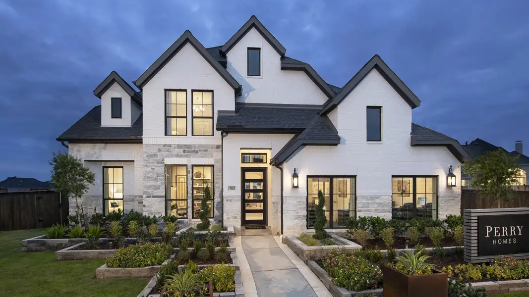 Representative exterior photo of a completed home built from the 3399W by Perry Homes in Briarley, Montgomery, TX (Image 28).