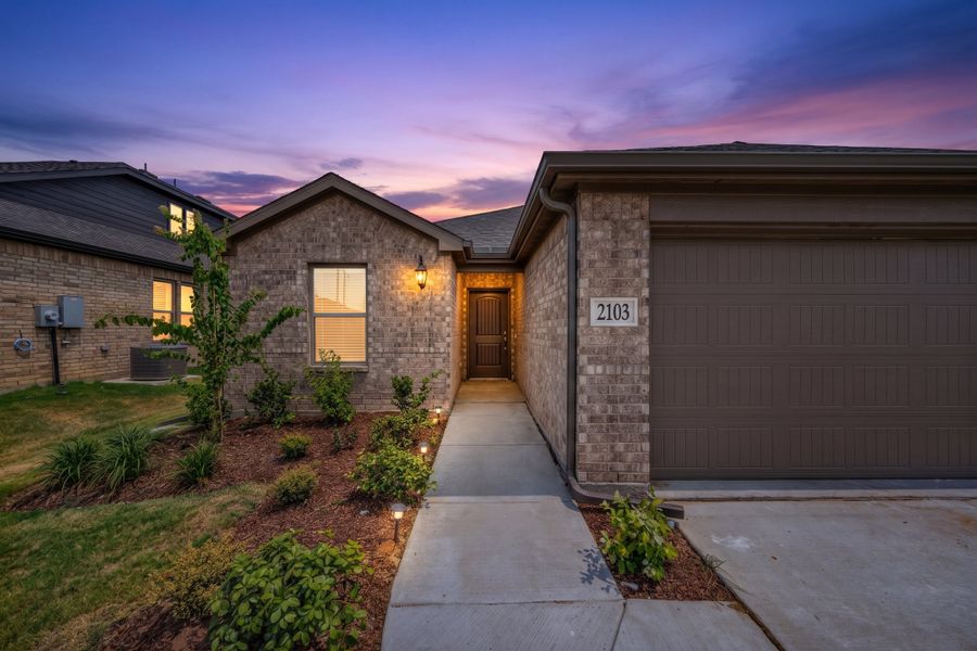Exterior details and patio area of a home in Stonecreek, Sulphur Springs (Image 3).