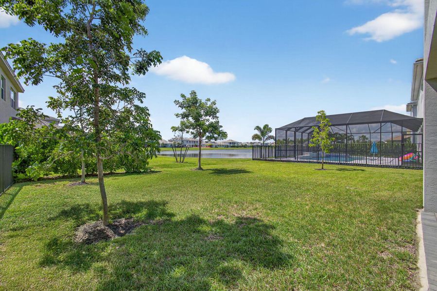 Front exterior of a new home in , The Acreage, FL, highlighting curb appeal (Image 22).
