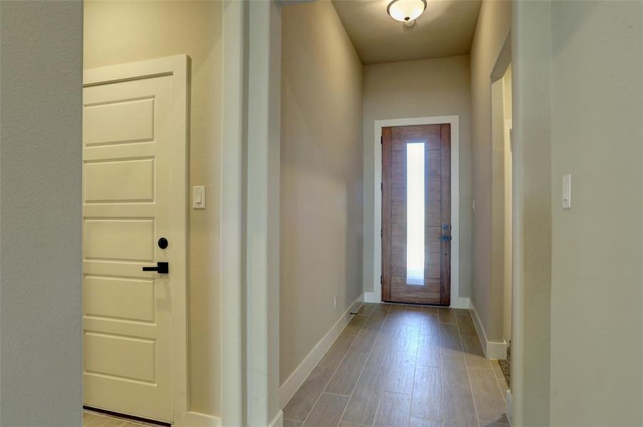 Entryway with light wood-type flooring