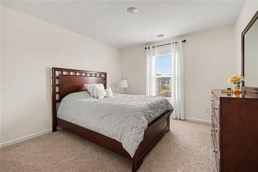 Furnished interior view inside a new home in Preserve at Dove Creek, Statham (Image 12).