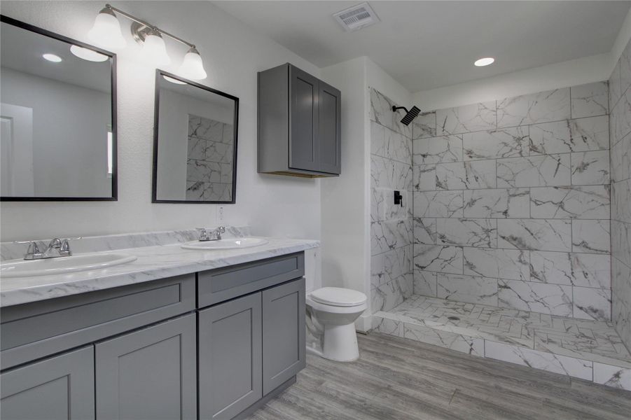 The master bathroom provides a spa like oasis perfect for relaxing. The master bathroom provides a spa like oasis perfect for relaxing.