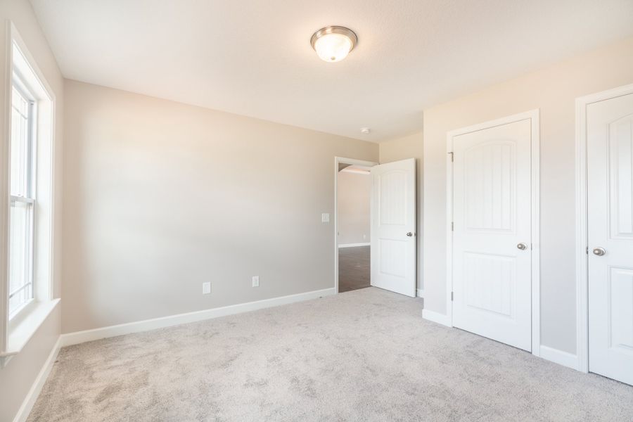 Representative unfurnished interior of a home built from the Sage by Enchanted Homes in Lonesome Dove, San Antonio (Image 26).