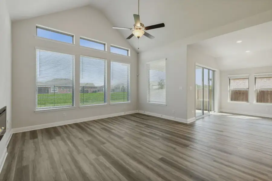 Representative unfurnished interior of a home built from the Raleigh by Chesmar Homes in Oaks of North Grove, Waxahachie (Image 9).