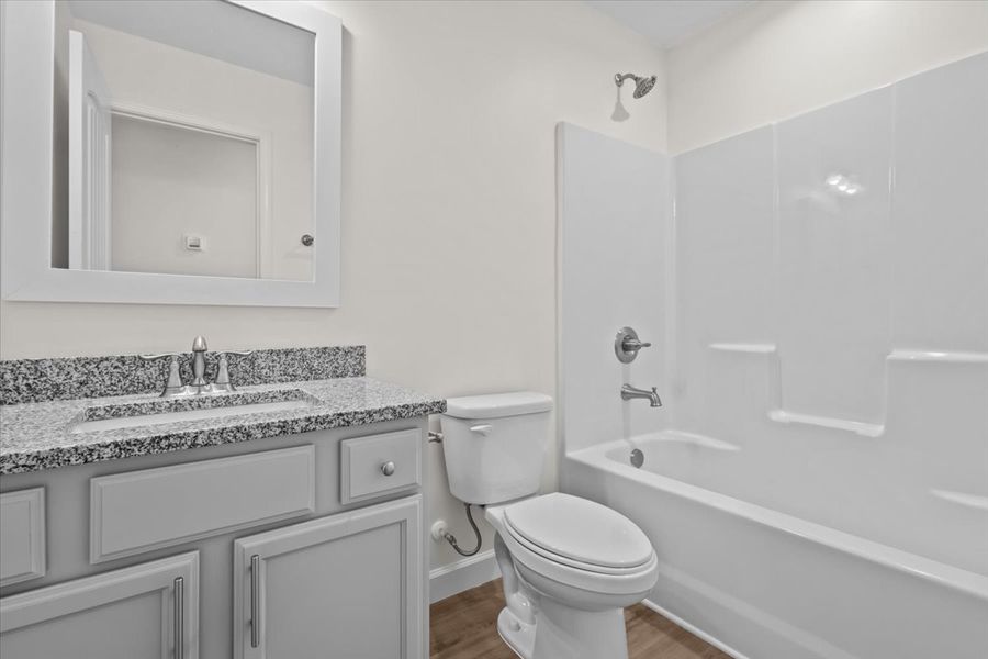 Representative furnished interior of a home built from the Drayton by Enchanted Homes in Lonesome Dove, San Antonio (Image 10).