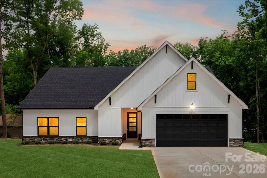 Front exterior of a new home in , Gastonia, NC, highlighting curb appeal (Image 22).