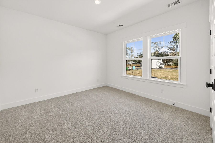 Spacious, unfurnished interior of a new home in Indigo Place, North Charleston (Image 25).
