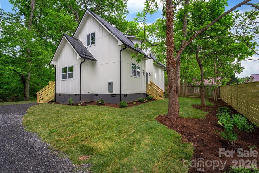 Exterior details and patio area of a home in , Asheville (Image 29).