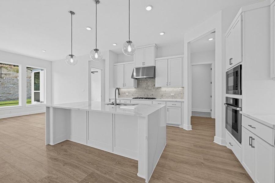 Furnished interior view inside a new home in Travisso, Leander (Image 5).