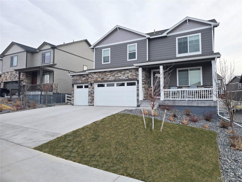 Front exterior of a new home in , Castle Rock, CO, highlighting curb appeal (Image 2).