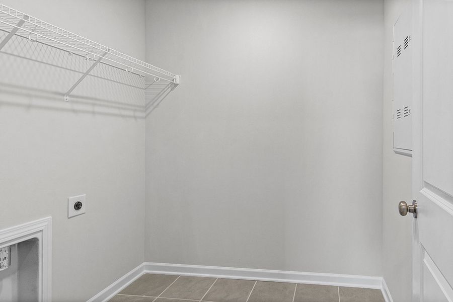 A white tiled room. A white tiled room.