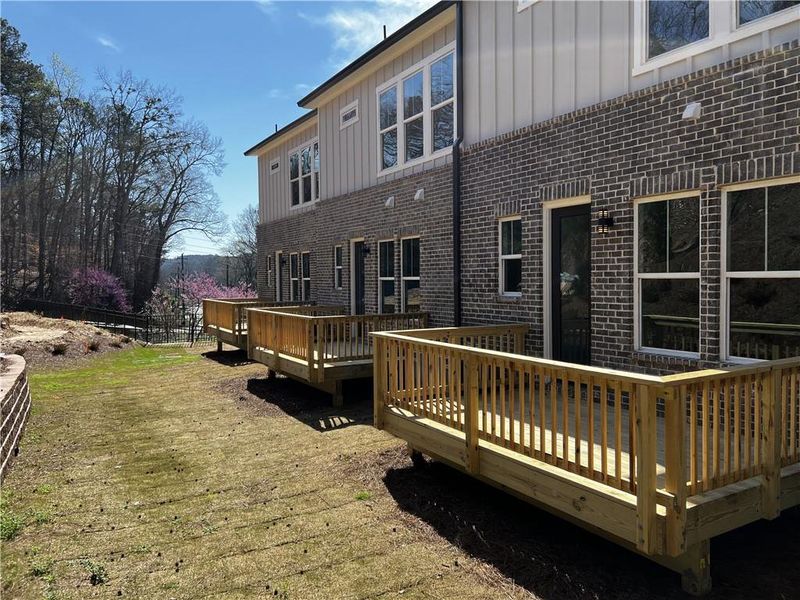 Front exterior of a new home in , Canton, GA, highlighting curb appeal (Image 2).