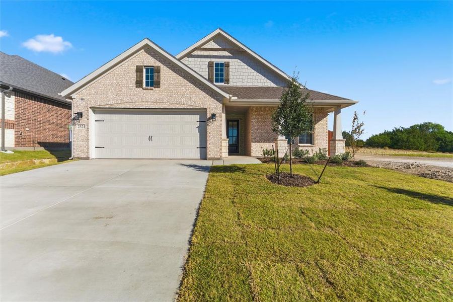 Front exterior of a new home in Waterford Park, Weatherford, TX, highlighting curb appeal (Image 22).