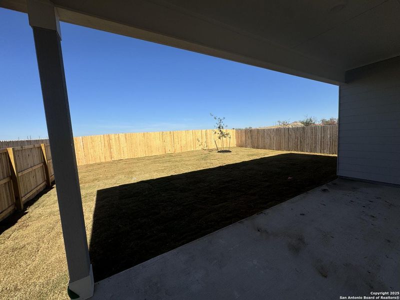 Exterior details and patio area of a home in Enclave at Hennersby Hollow 50's, San Antonio (Image 4).