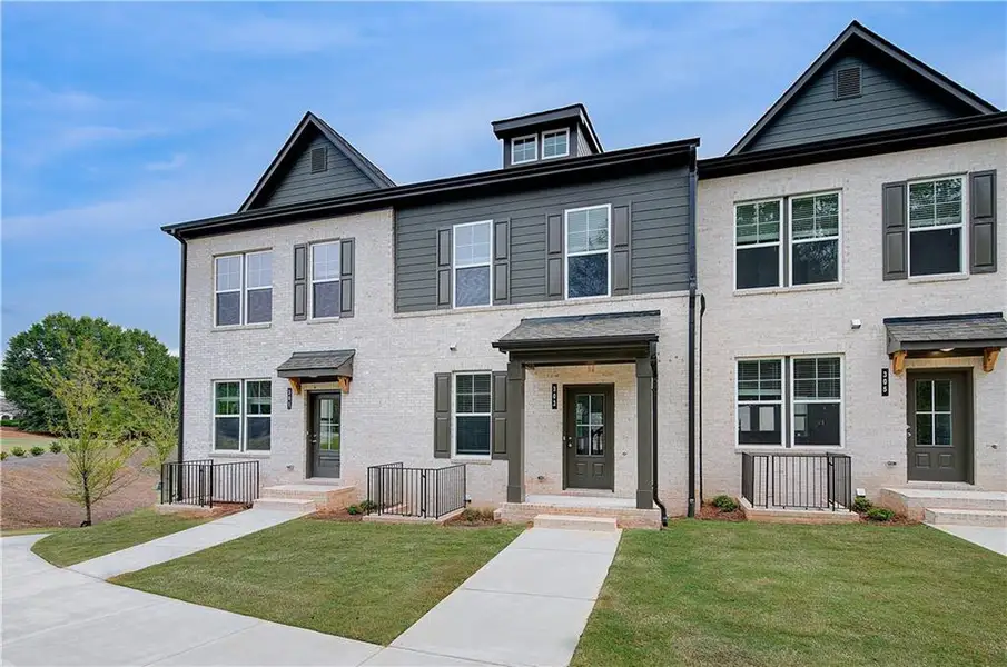 Front exterior of a new home in Daybreak, Newnan, GA, highlighting curb appeal (Image 17).