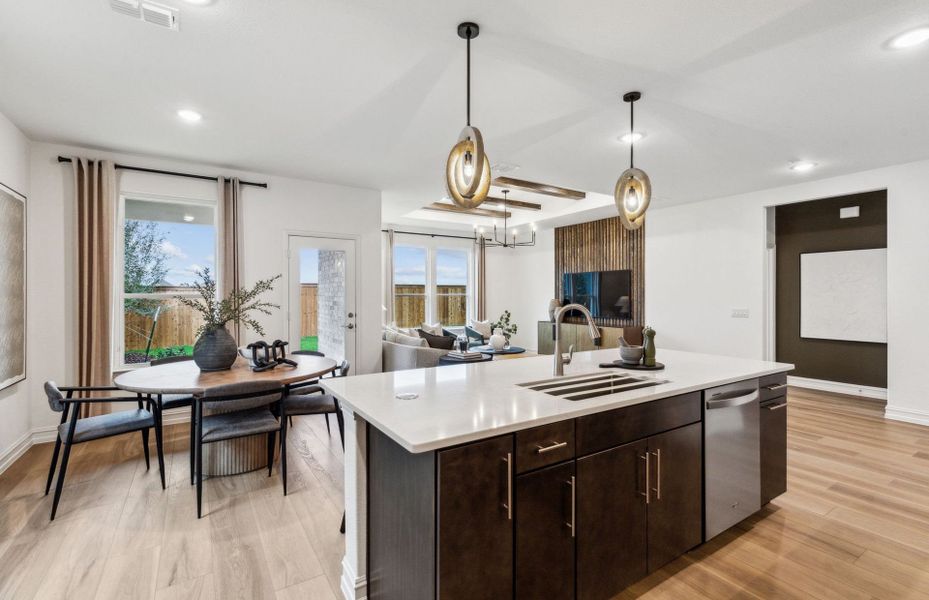 Large kitchen island overlooking main living areas