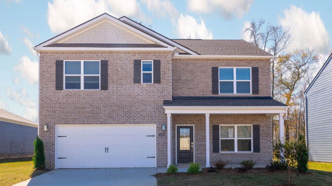 Front exterior of a new home in Fairview Hills, Cleveland, TN, highlighting curb appeal (Image 1).