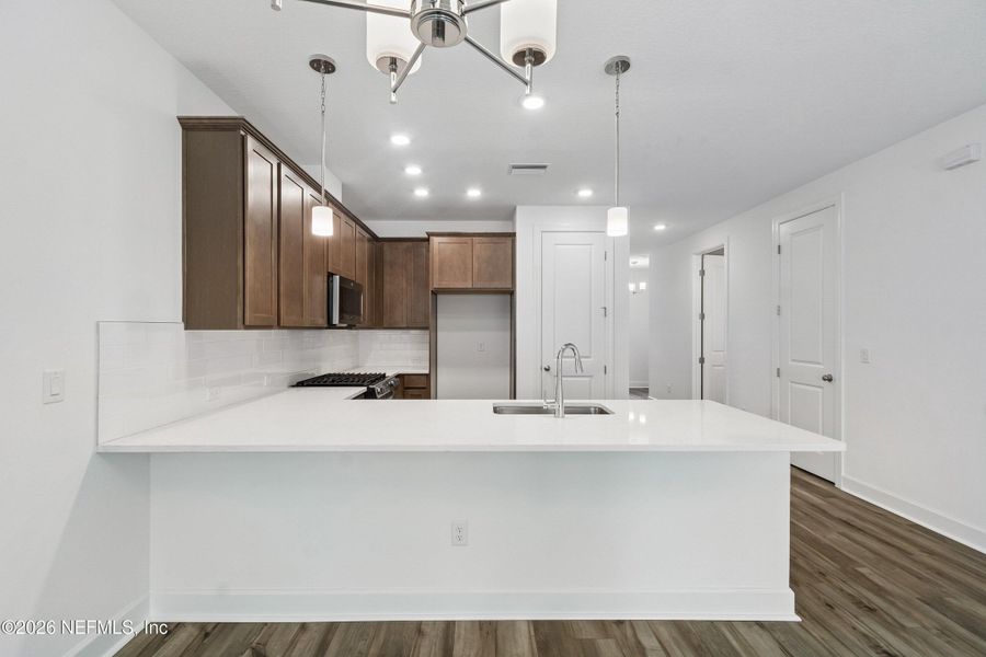 Furnished interior view inside a new home in Westerly Park at Wildlight – Overlook Collection, Yulee (Image 11).