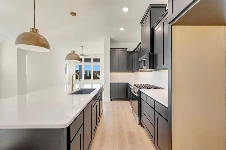 Furnished interior view inside a new home in Creekshaw – Classic, Royse City (Image 8).