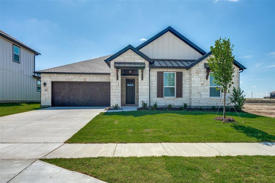 Front exterior of a new home in Sierra Vista at Kelly Ranch, Aledo, TX, highlighting curb appeal (Image 1). Front exterior of a new home in Sierra Vista at Kelly Ranch, Aledo, TX, highlighting curb appeal (Image 1).