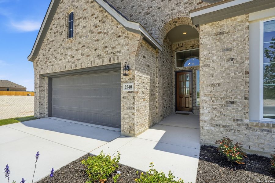 Exterior details and patio area of a home in Prominence Urban, San Antonio (Image 28).