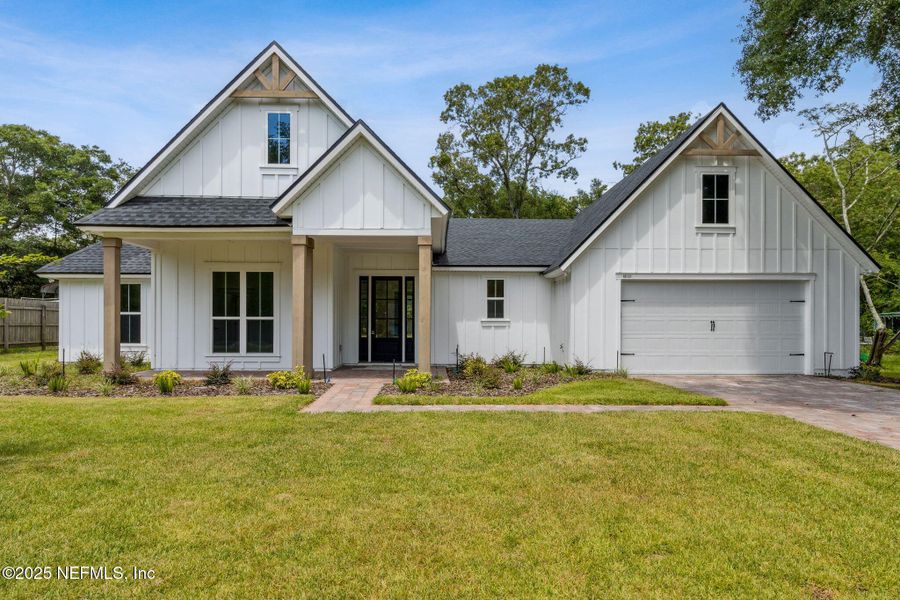 Front exterior of a new home in , Fernandina Beach, FL, highlighting curb appeal (Image 26).