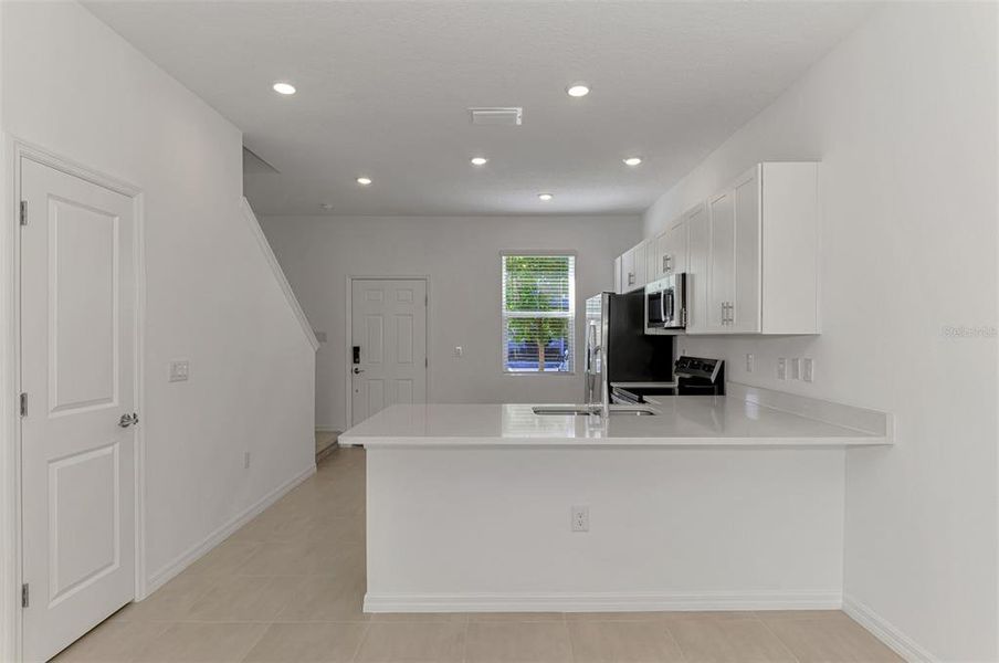 Furnished interior view inside a new home in , Sarasota (Image 9).