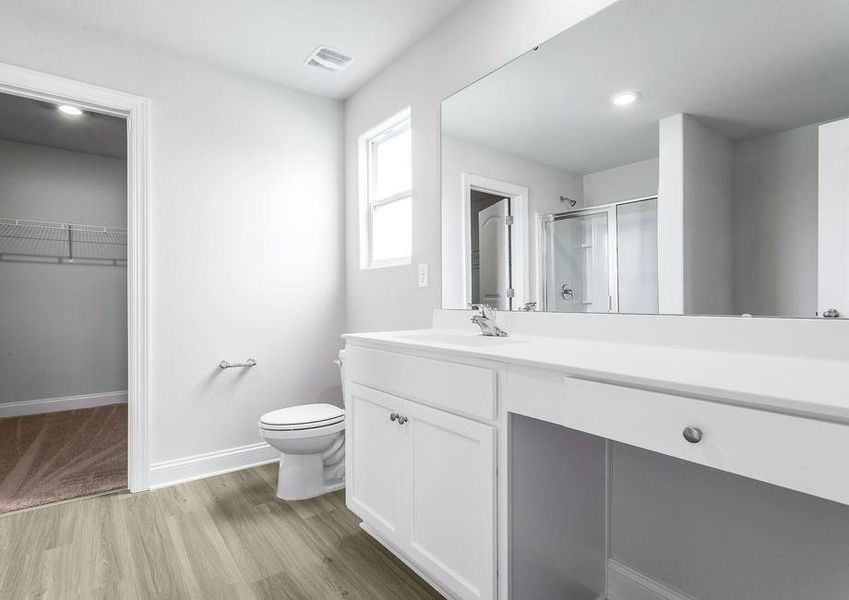 Master bath with a large vanity.